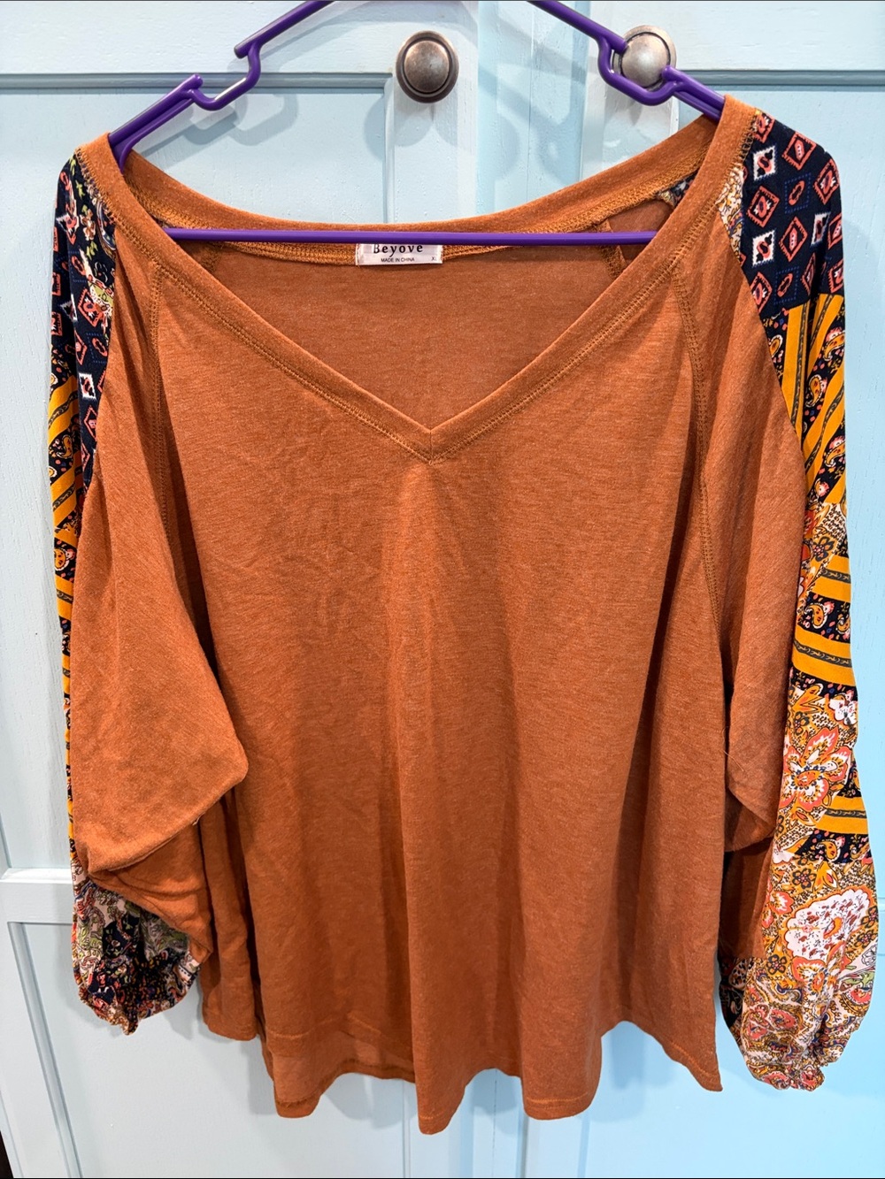 Beyond Rust V-Neck Tunic with Patterned Dolman Sleeves